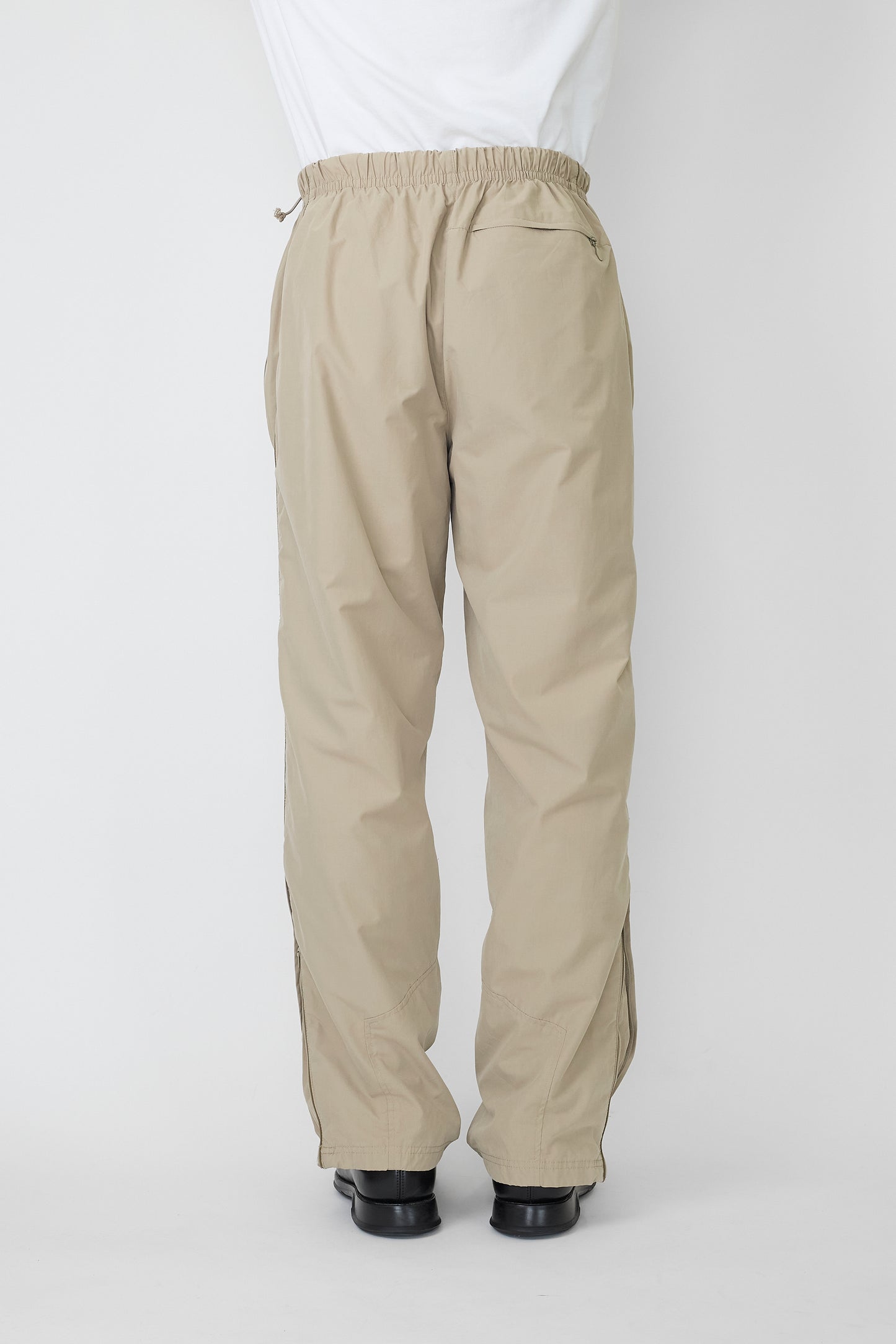 NIKE DESIGNED BEIGE TECH WIDE PANTS