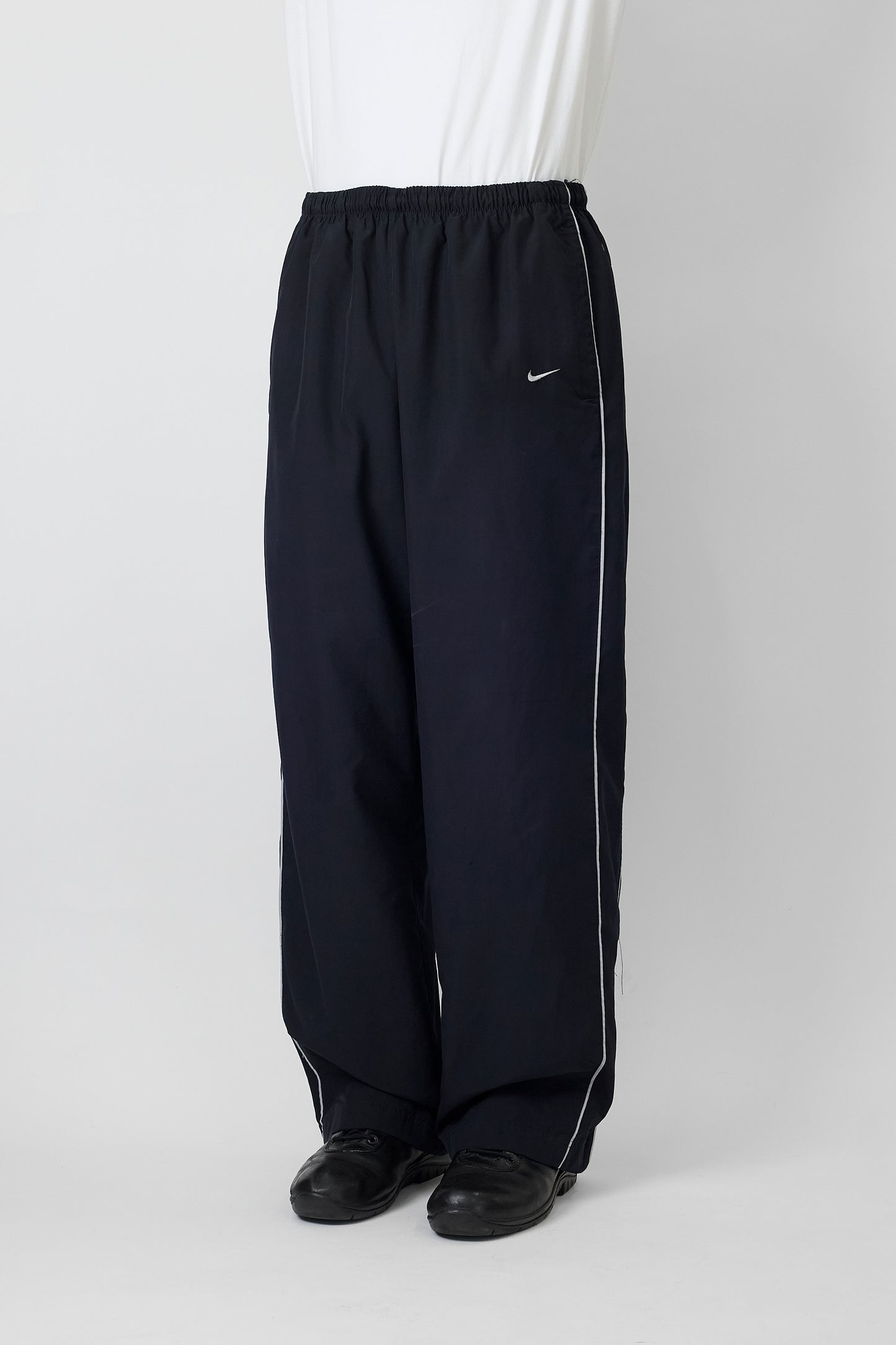 NIKE BLACK NAVY TECH WIDE PANTS