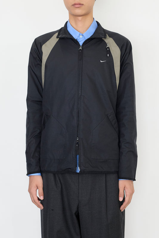 NIKE DESIGNED TECH SHORT JACKET