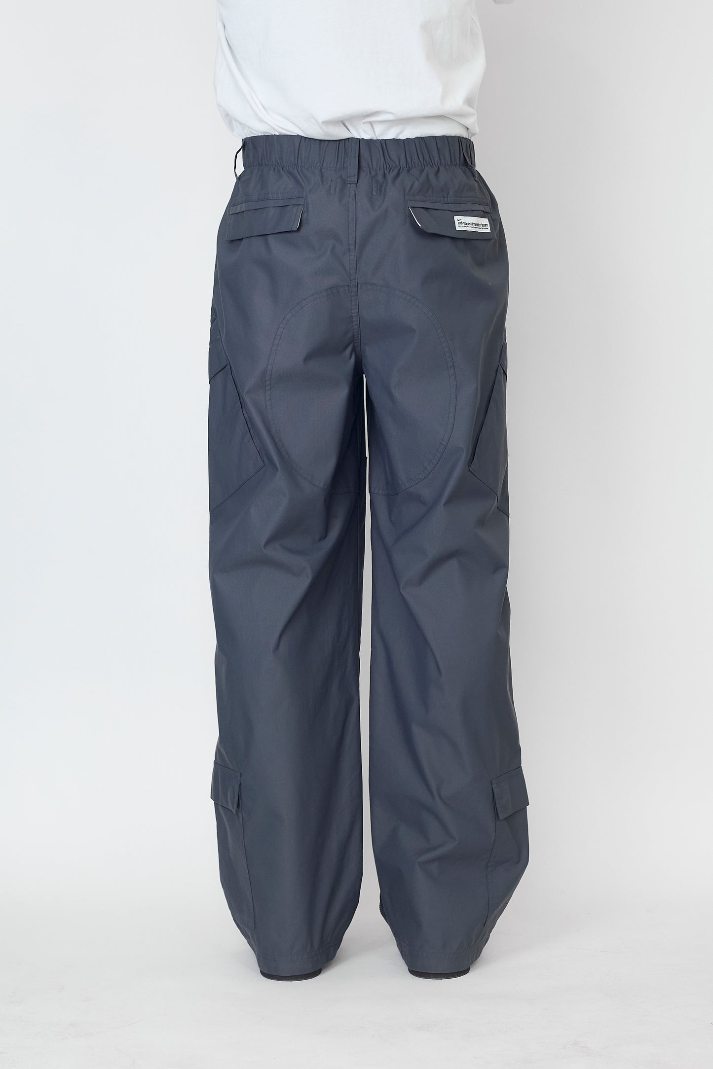 NIKE ADVANCED INNOVATION TEAM DESIGNED TECH NYLON WIDE PANTS