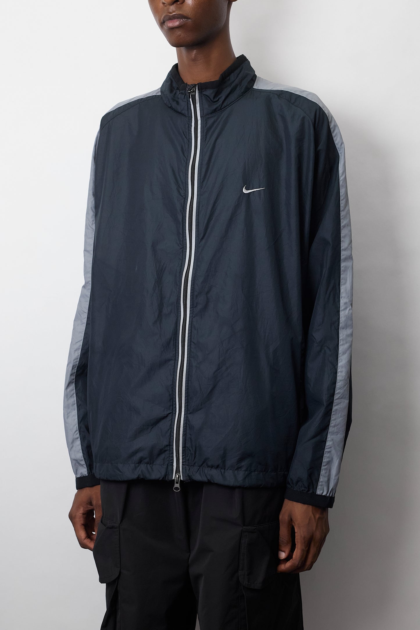 NIKE DESIGNED TECH SHORT JACKET