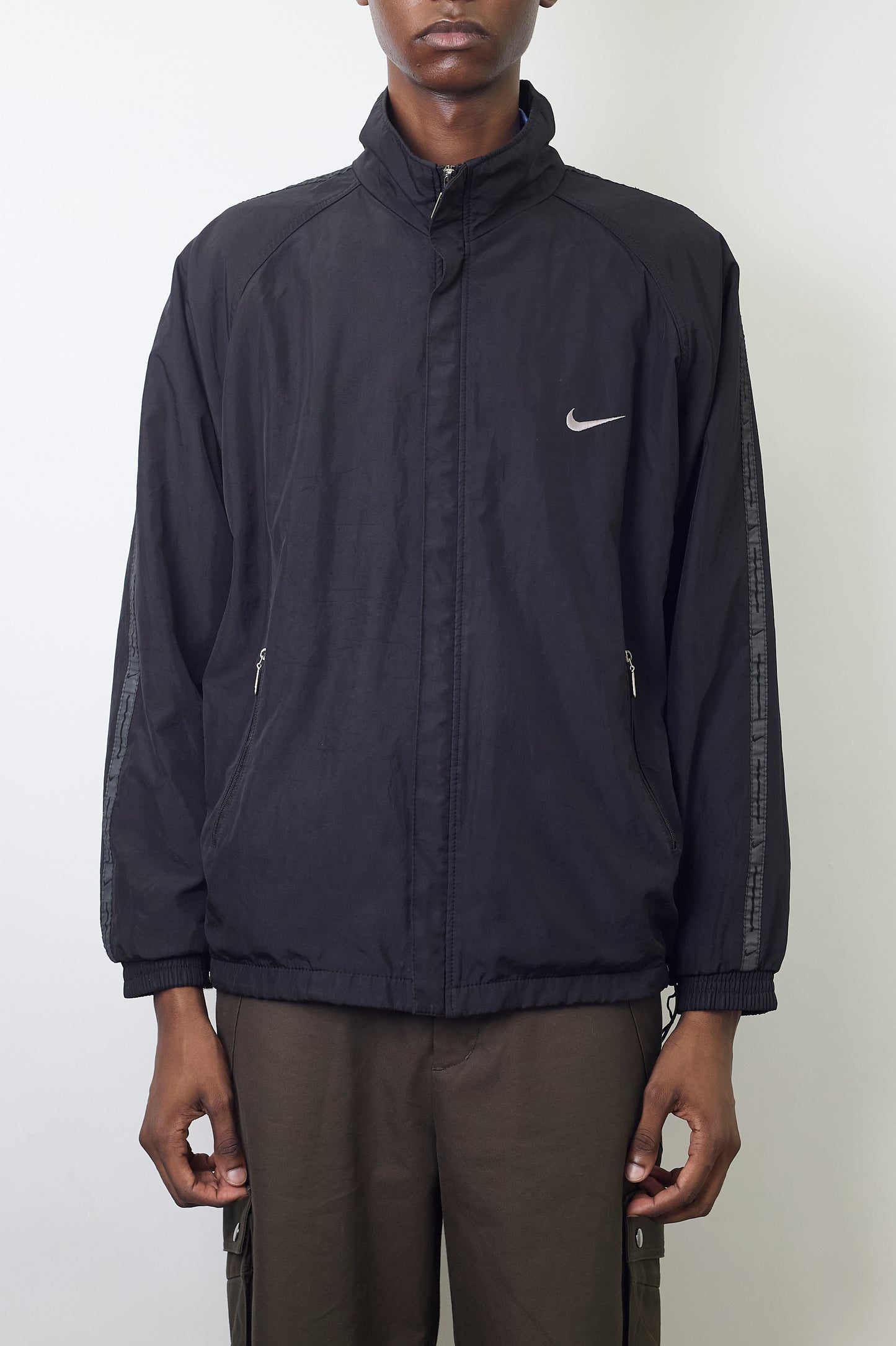 NIKE DESIGNED TECH SHORT JACKET