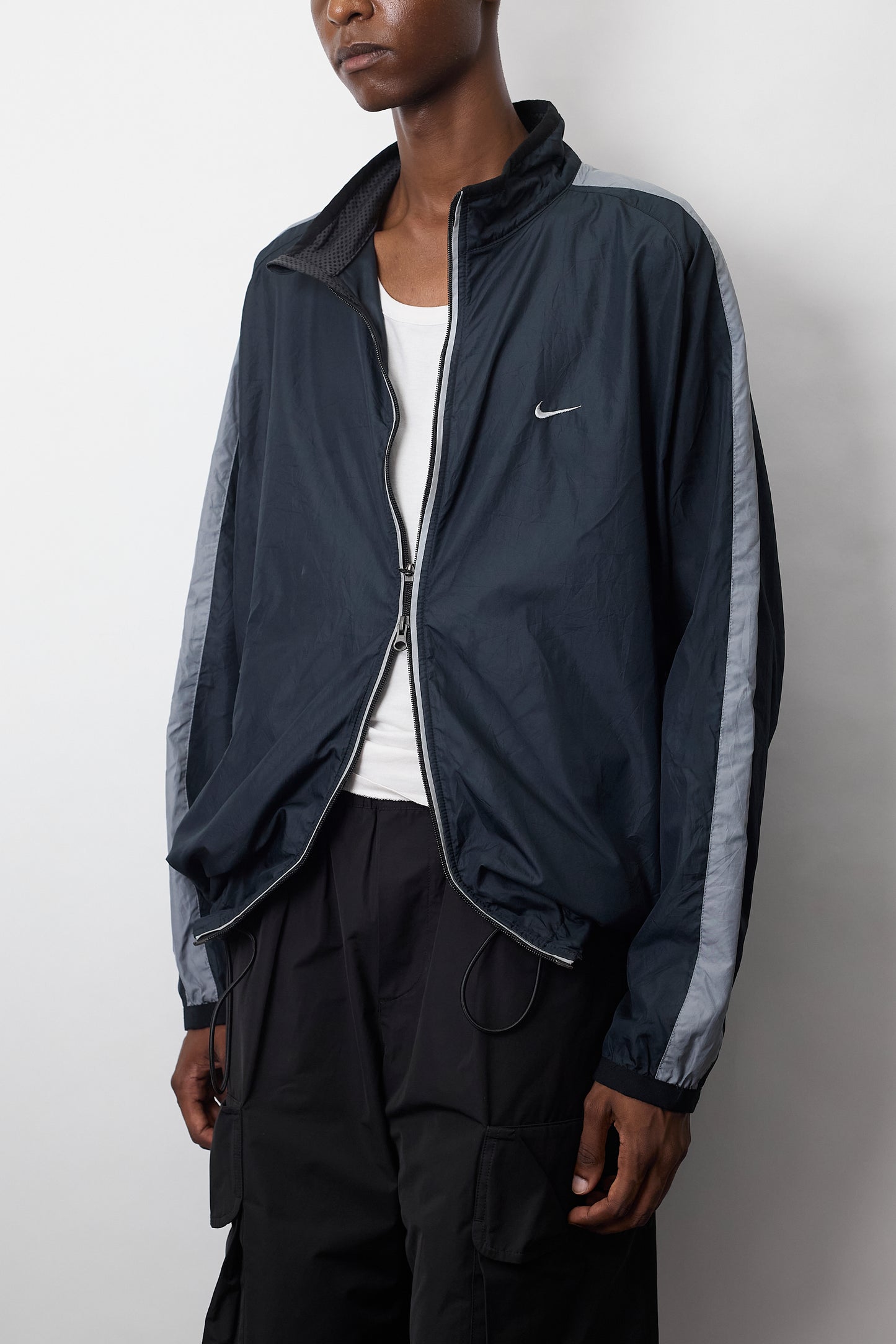 NIKE DESIGNED TECH SHORT JACKET