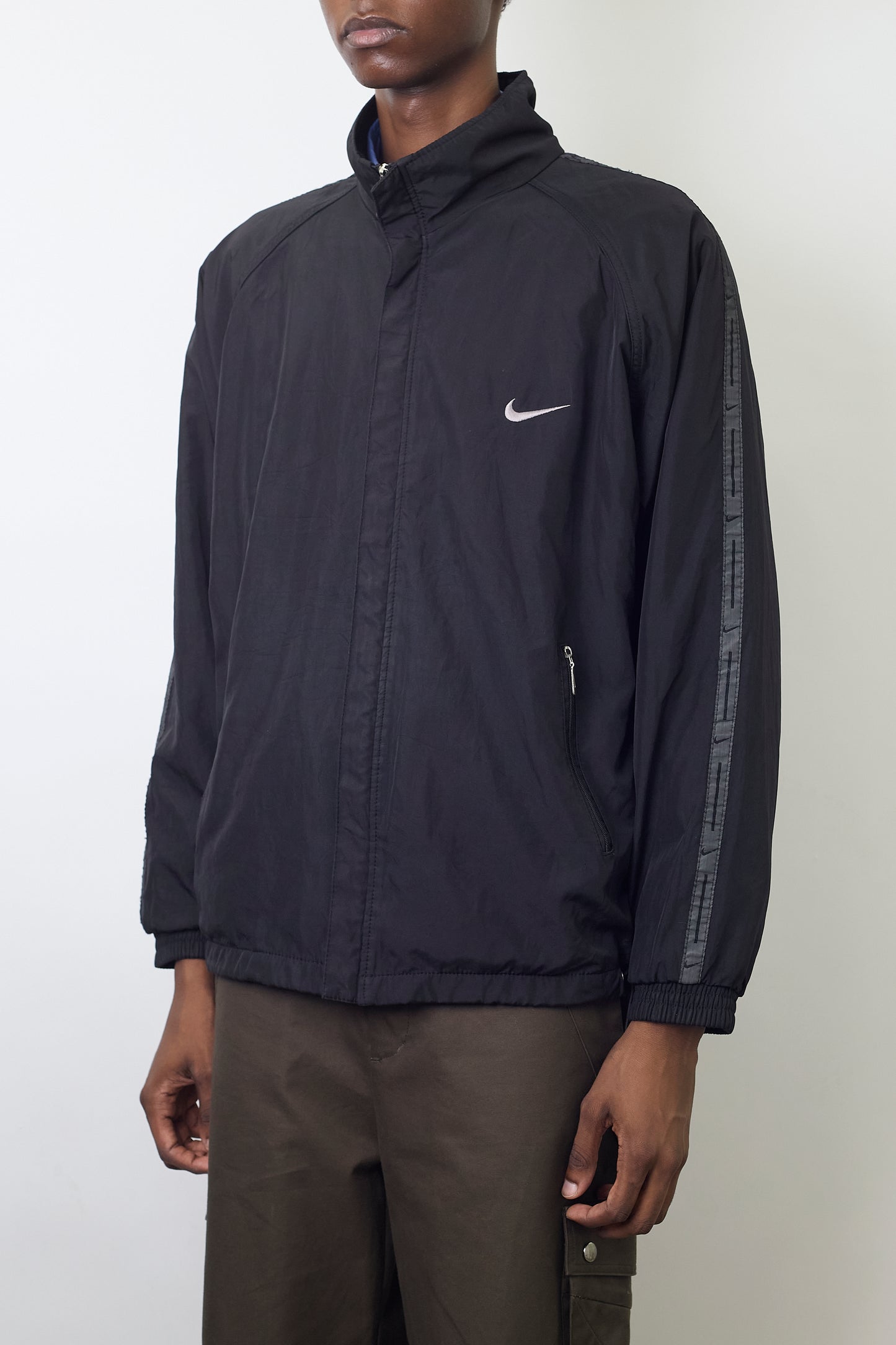 NIKE DESIGNED TECH SHORT JACKET